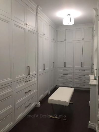 Walk In Closet with Cabinet and Drawer Combination