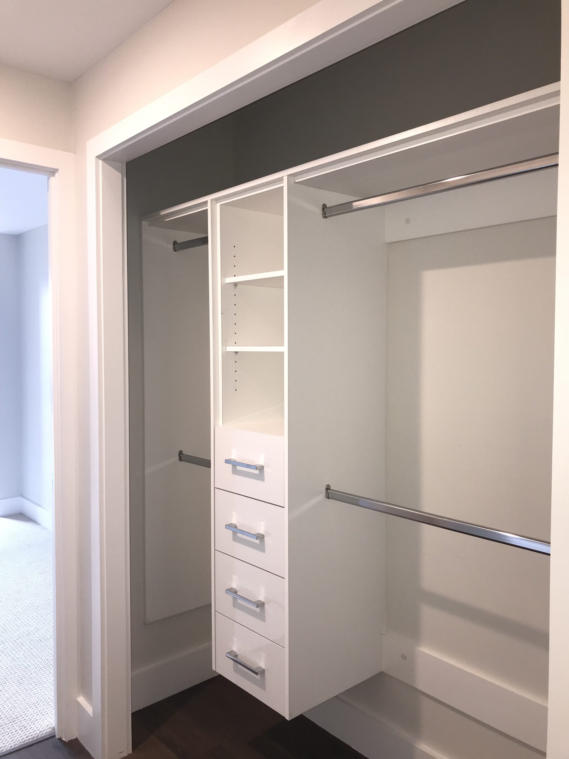 Central Cabinet Unit and Side Build In Coat Racks
