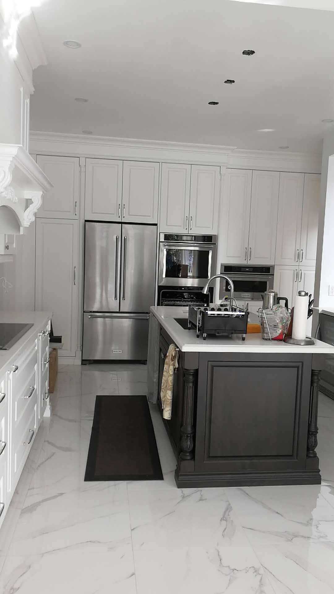 Ascending/Descending Upper Cabinet Design to Match Appliance
