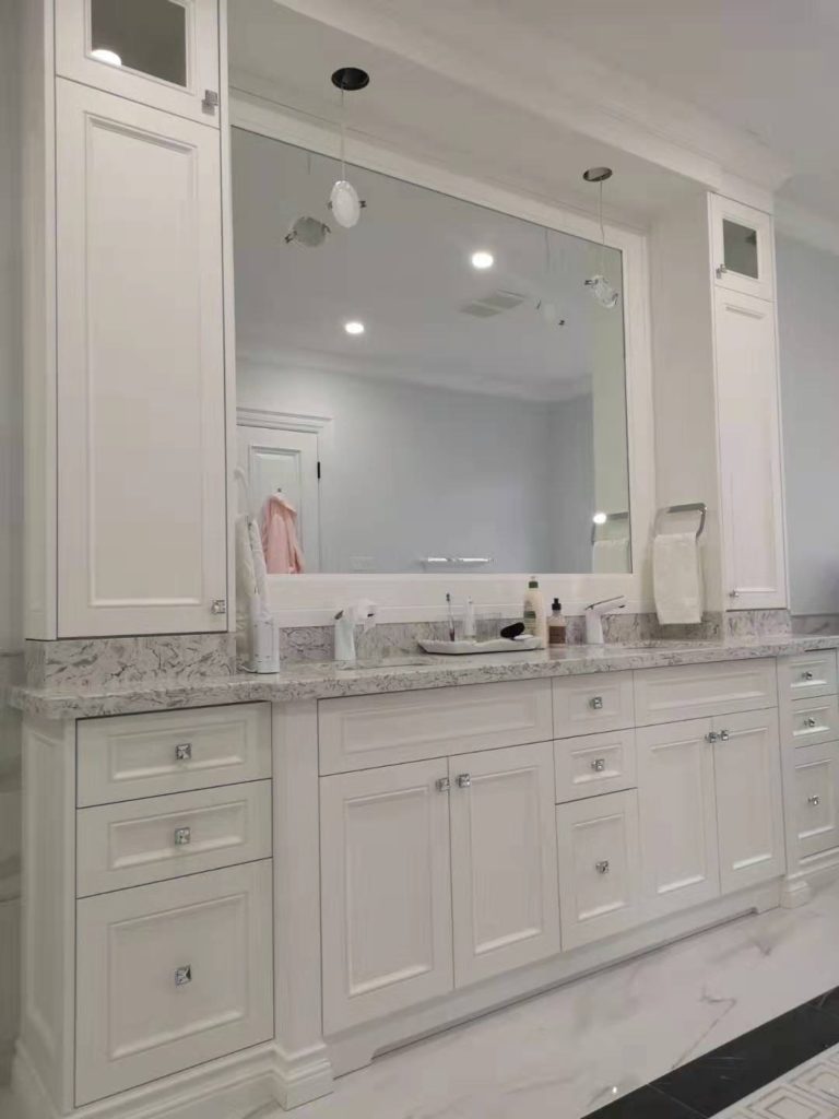 Wide Tower Cabinet Built Above Back Splash Stone