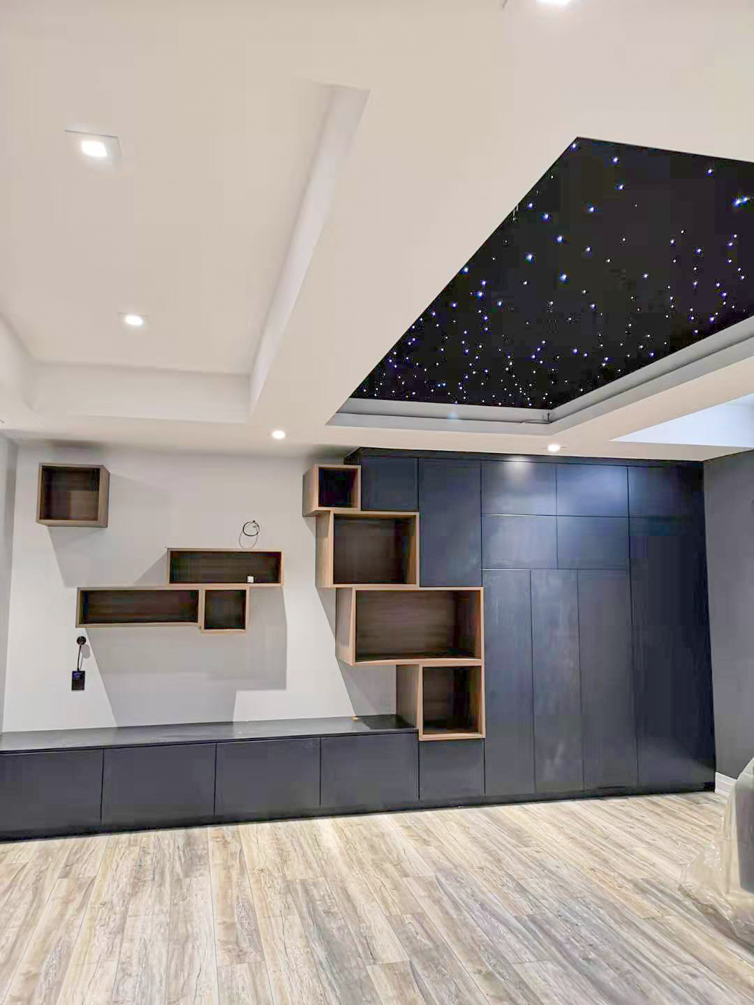 wall unit in painted blue and wood box