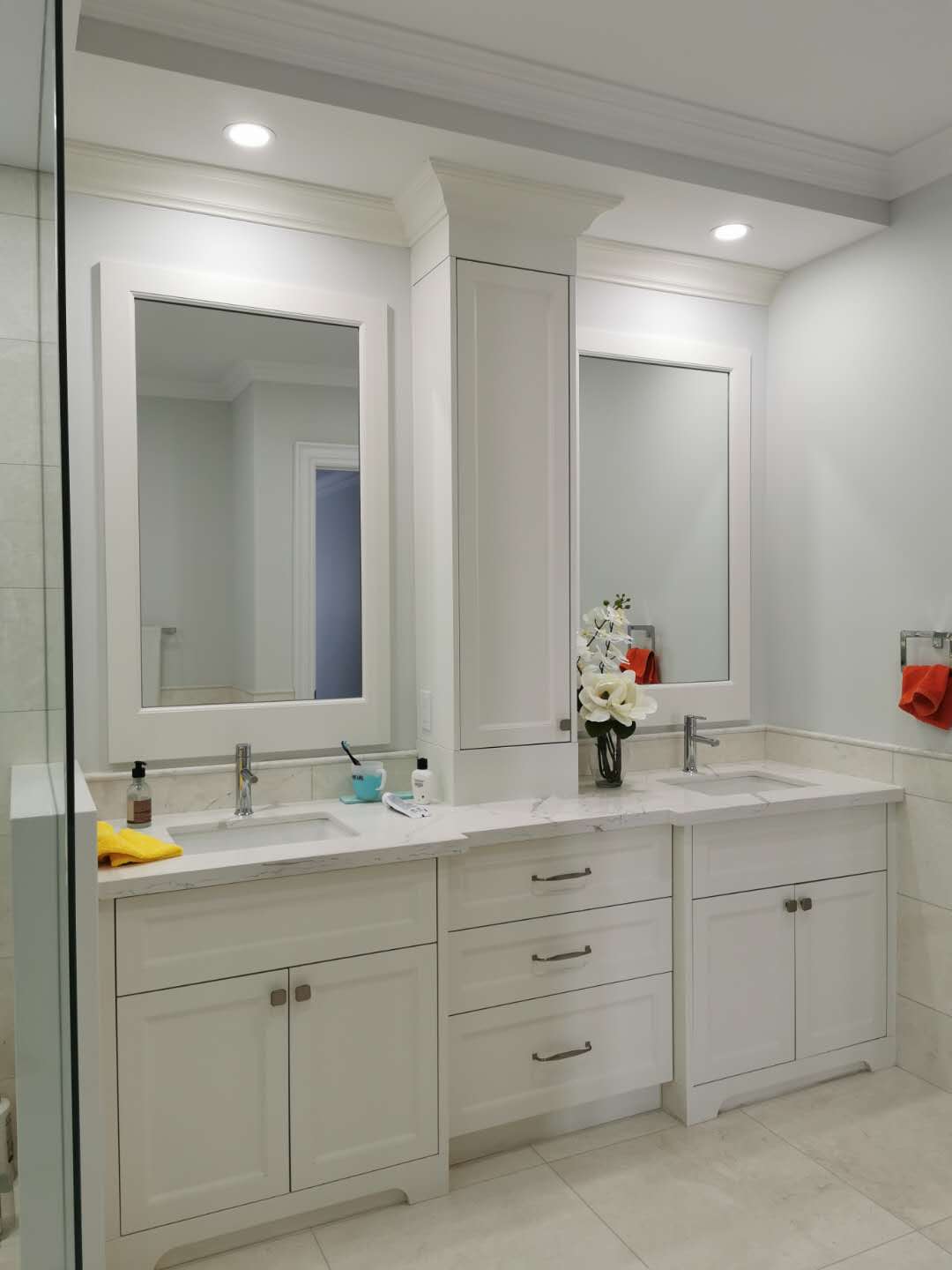 All White Cabinetry Paired with White Countertop with Vein