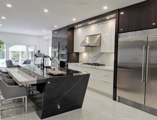Modern & Contemporary Kitchen Featuring Angled Central Island and Painted High Gloss Cabinet in White