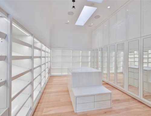 Master Walk-In White Closet with Mirrors and Island